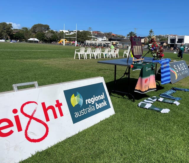 Merewether Carlton flying the Eight logo high